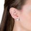 Folded heart stud earrings with pave set crystal halo