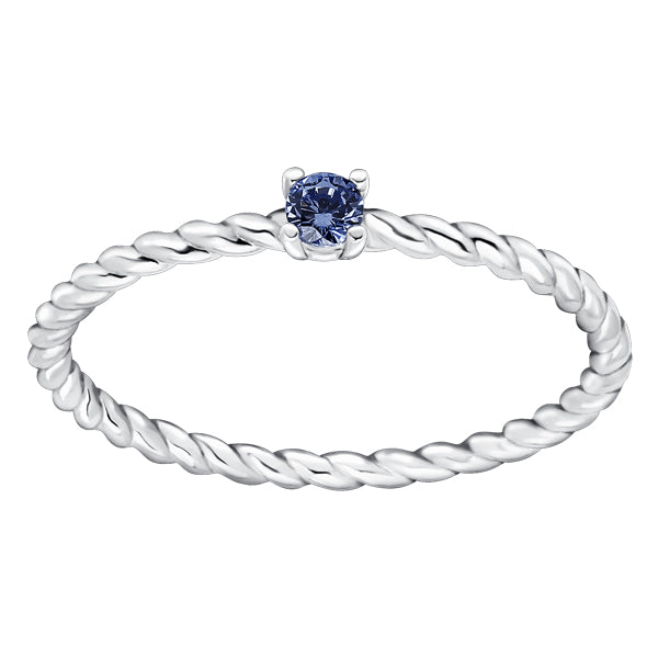 Subtle twisted silver ring with Tanzanite colour crystal as December birthstone