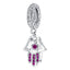 Hamsa hand bangle charm hanging on pave set hoop