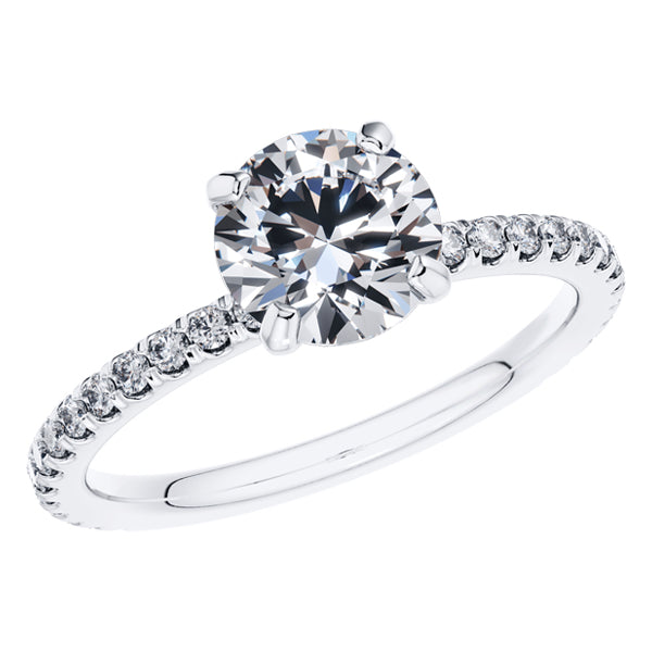 Elegant 4 Claw 18ct White Gold Round Brilliant Engagement Ring with Diamond Sides .