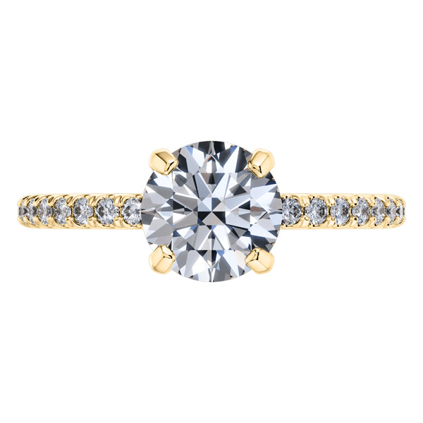 Elegant 4 Claw 18ct yellow Gold Round Brilliant Engagement Ring with Diamond Sides .