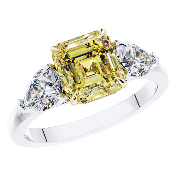 GIA Certified Fancy Vivid Yellow Diamond 3 Stone Engagement Ring set in Platinum